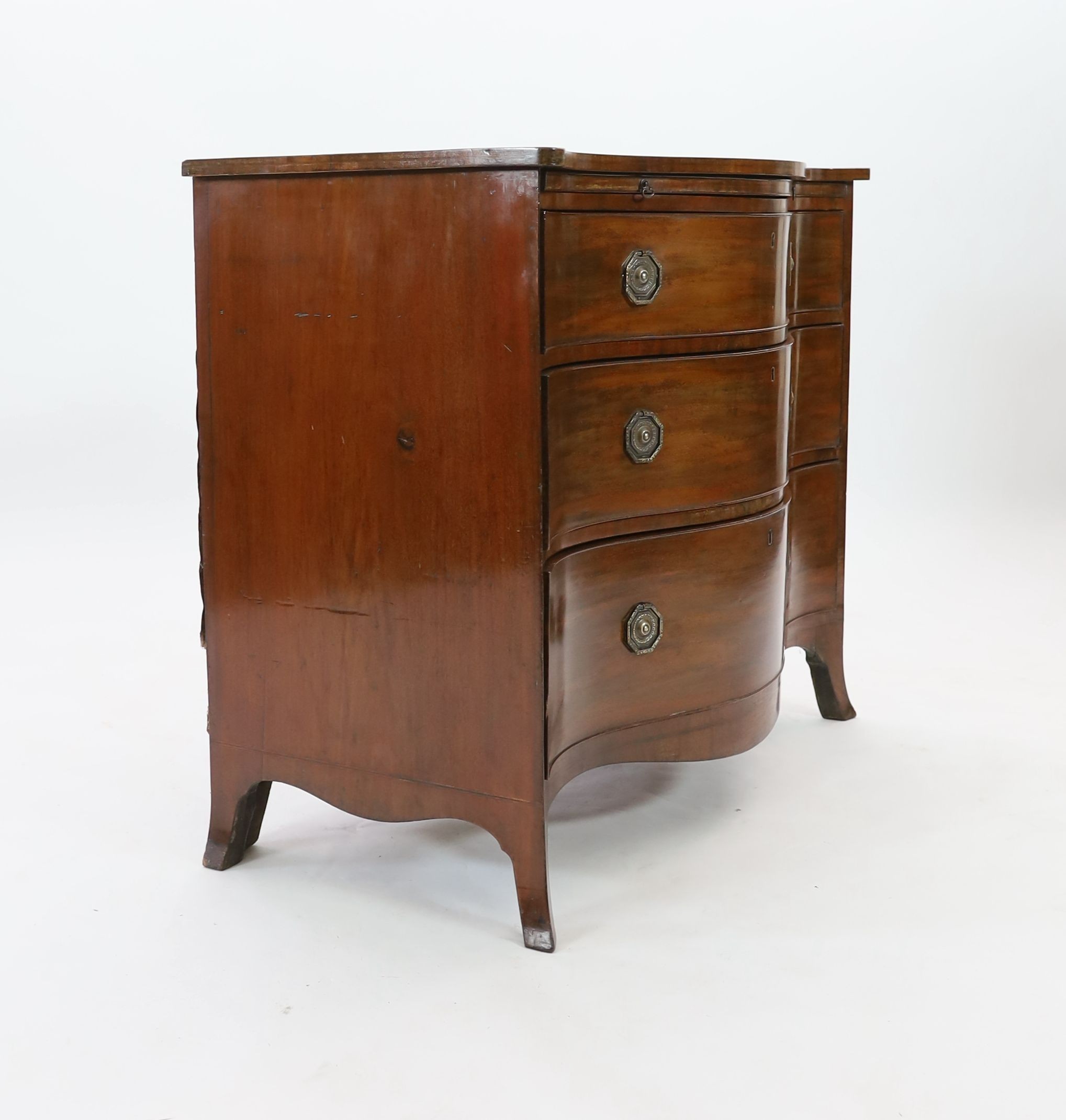 A George III mahogany serpentine chest, W.111cm D.60cm H.93cm